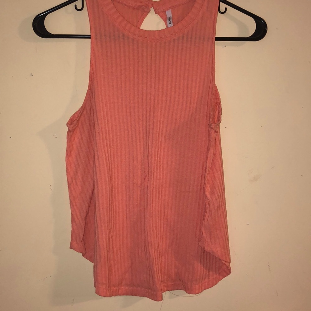 Peach tank top.